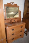 Late Victorian American walnut mirror back three drawer dressing chest