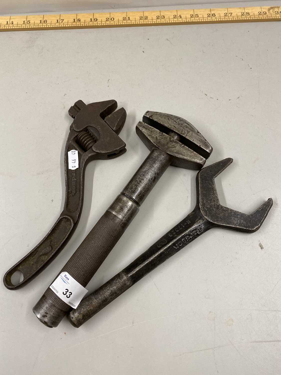 Fordson adjustable spanner together with a further spanner and an adjustable wrench