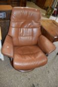 Brown leather recliner armchair
