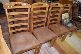 Set of four modern oak ladder back dining chairs