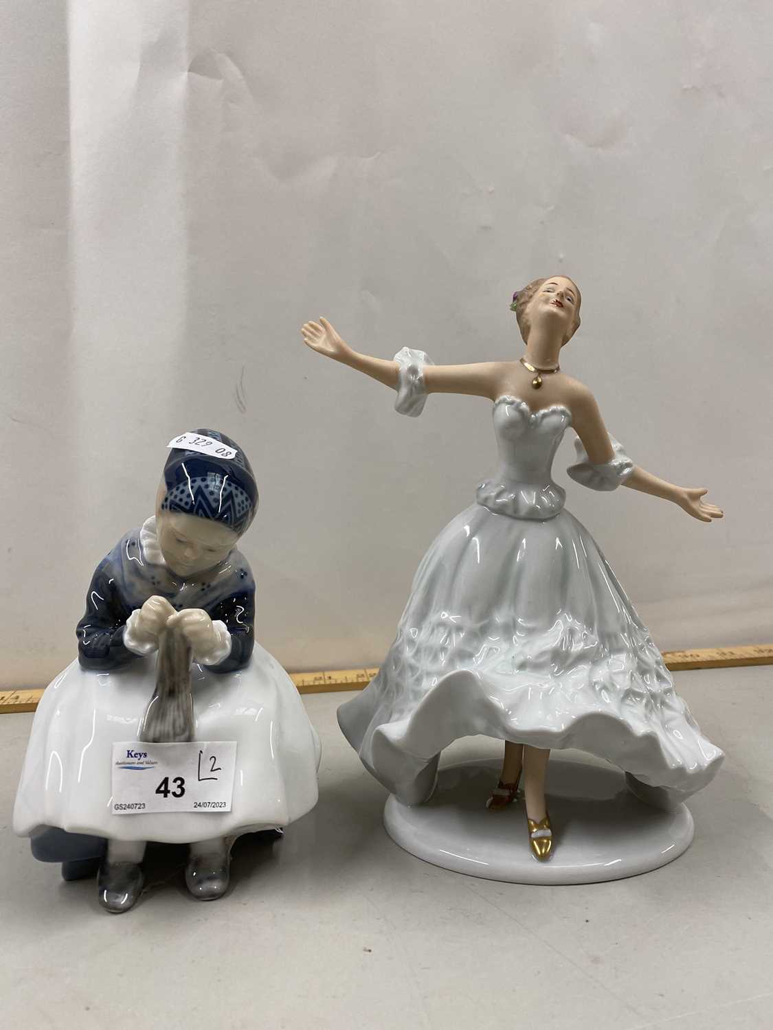 Royal Copenhagen figure of a girl sewing together with a Wallendorf figure of a dancer (2)