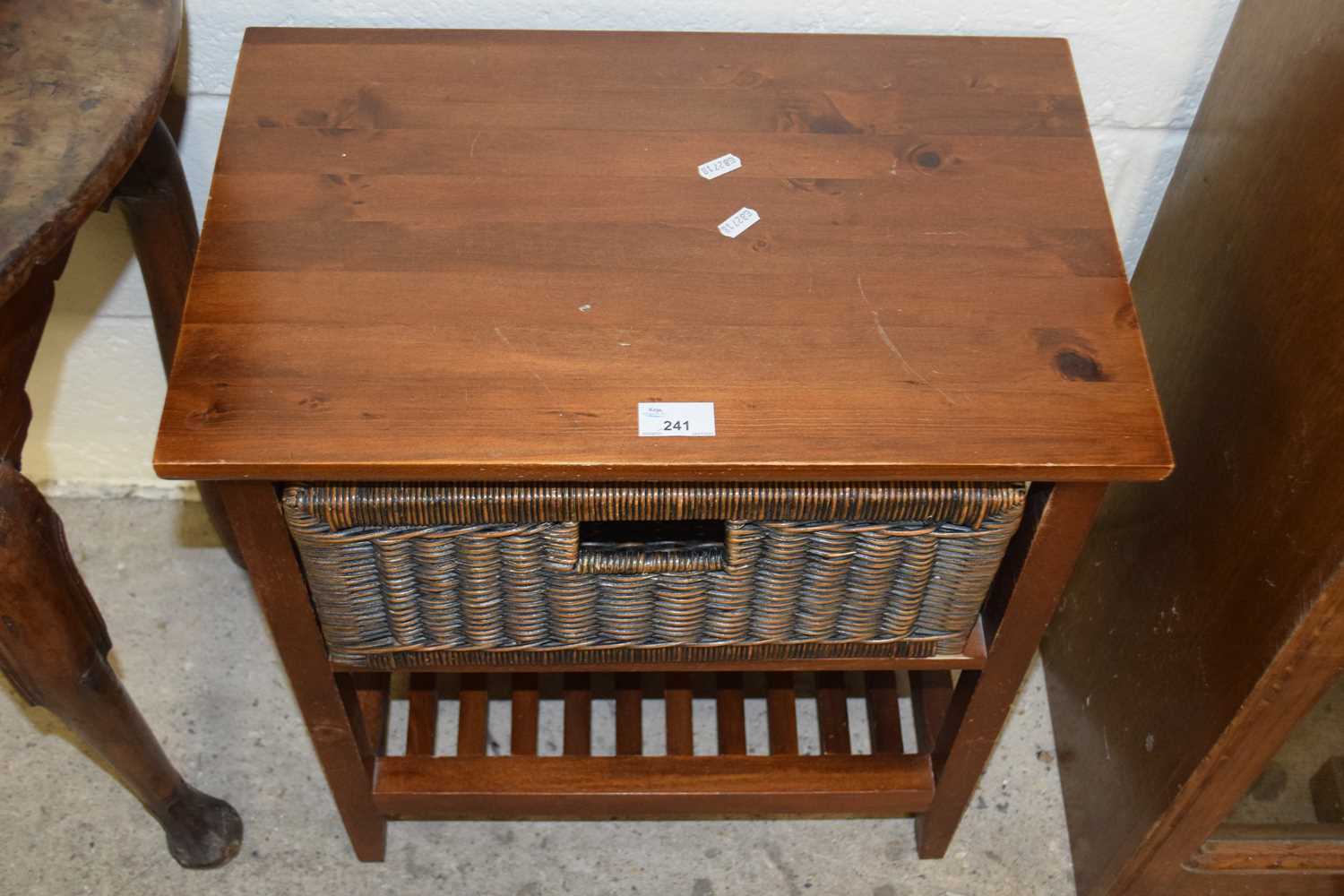 Small bedside cabinet with basket drawer