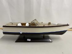 A model boat on stand