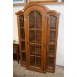 Modern oak glazed display cabinet with domed top