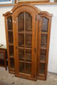 Modern oak glazed display cabinet with domed top