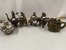 A collection of reproduction Chinese metal wares to include novelty teapot, incense burners etc