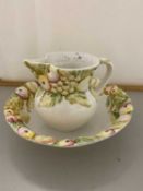 Fruit decorated wash bowl and jug