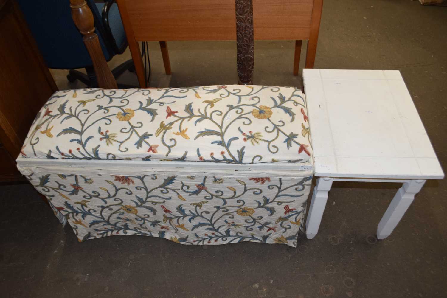Storage stool with hinged lid and crewl work upholstered cover together with a white painted