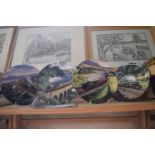 Four Royal Doulton plates decorated with trains