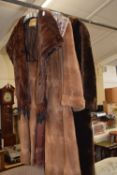 Ladies brown fur coat together with a faux fur coat and a fur stole (3)