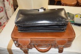 Black leather gladstone style bag together with a suitcase (2)