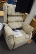 An upholstered easy riser and recliner
