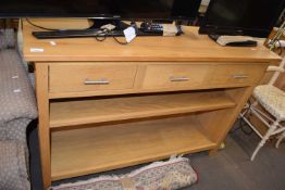 Modern sideboard with three drawers and shelves below