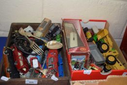 Two boxes of various vintage toy vehicles and other items
