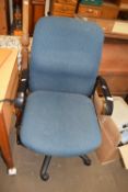 Blue upholstered swivel office chair