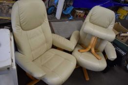Pair of revolving armchairs and accompanying footstool