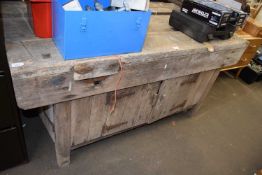 Wooden work bench and metal vice