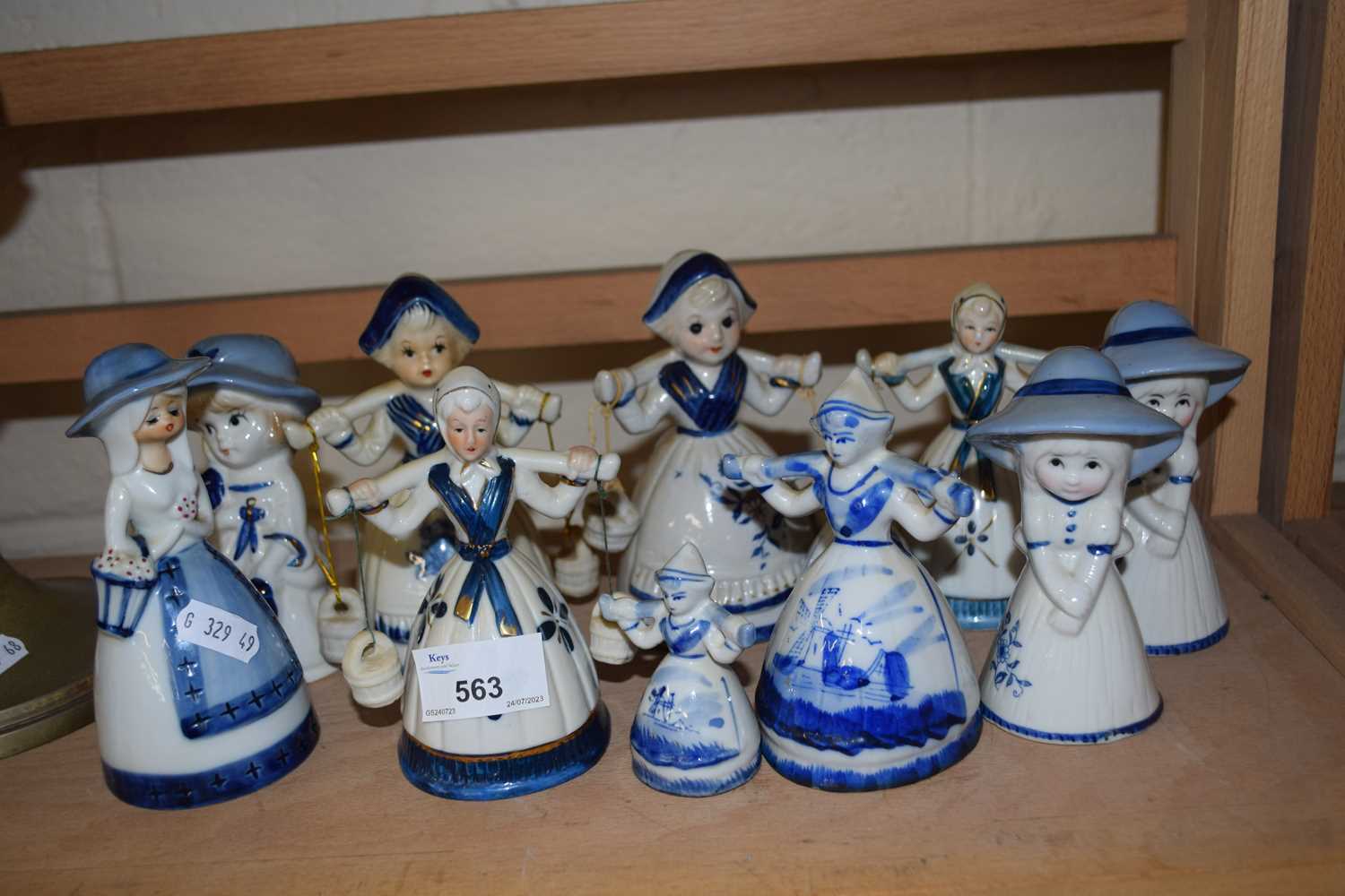 Collection of blue and white figural bells