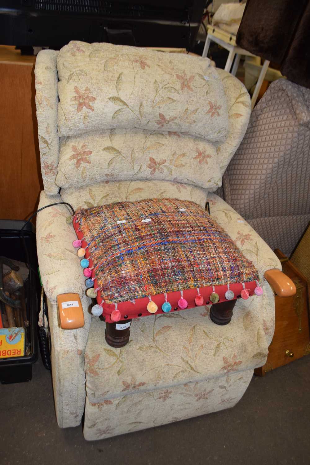 An electric easy chair together with an upholstered foot stool