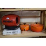 Mixed Lot: Le Creuset saucepans, a Watneys barrel ornament and a cheese slicer