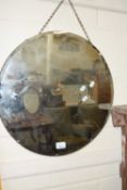 Circular bevelled wall mirror
