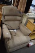 Brown upholstered easy chair riser/recliner