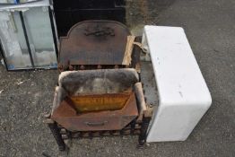 White Belfast style sink together with two cast iron fire grates