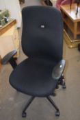 A black office swivel chair