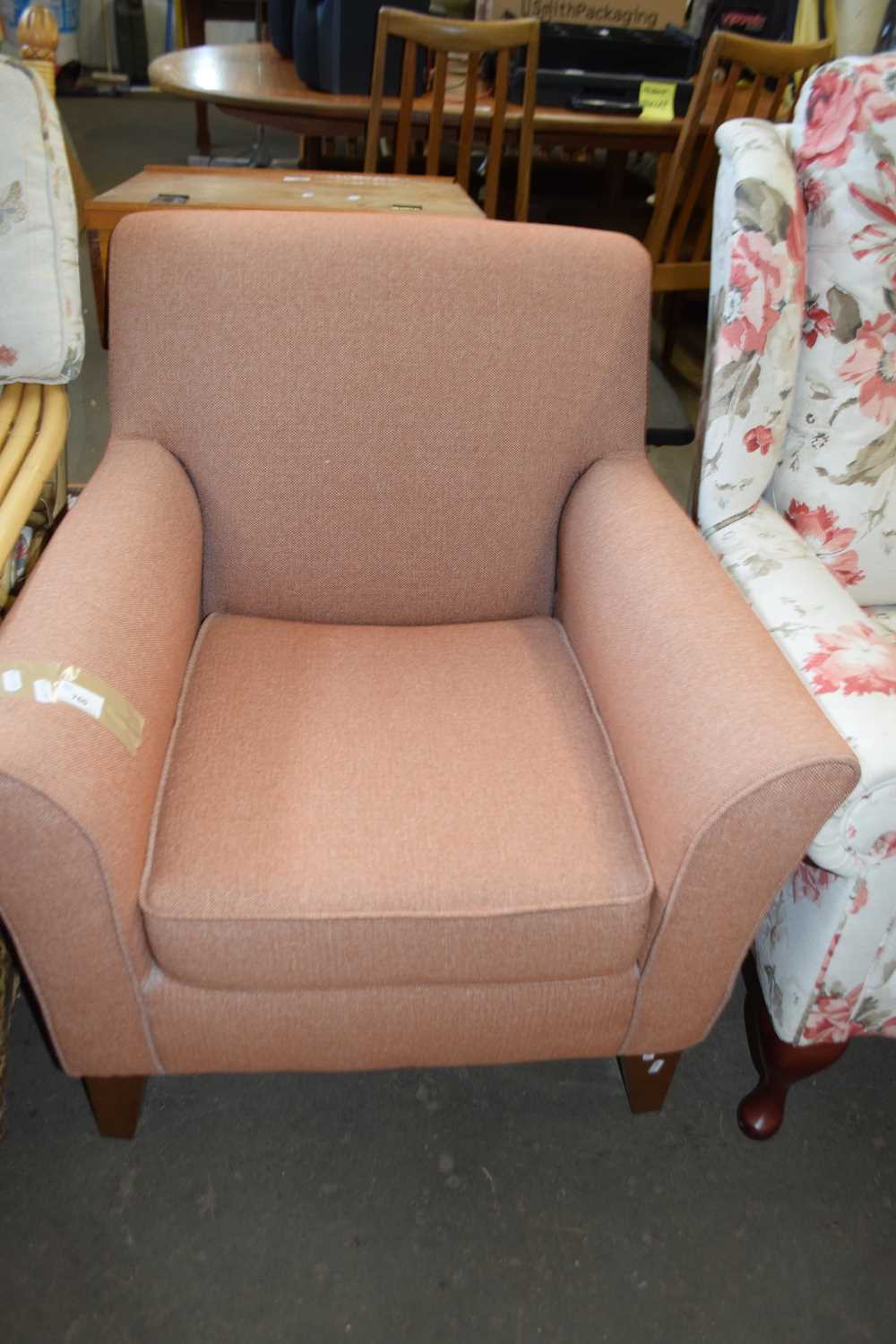 Terracotta upholstered armchair