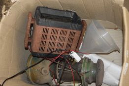 Box of mixed items to include a battery charger, storm lantern etc