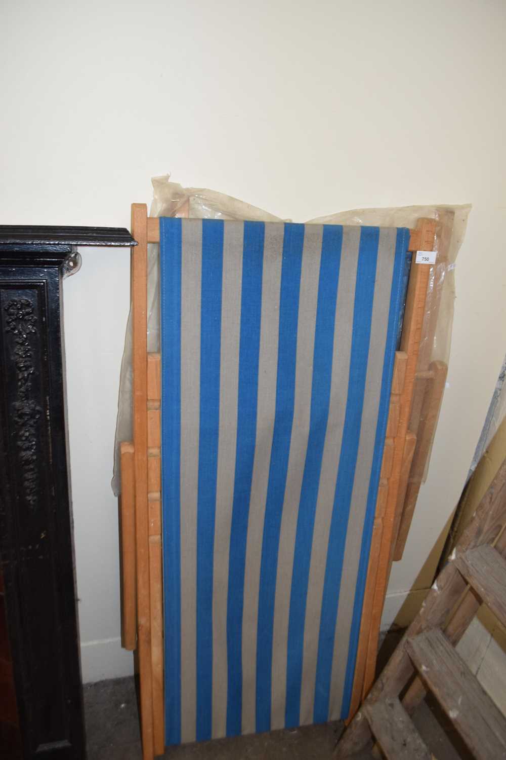 Pair of blue and grey striped deckchairs