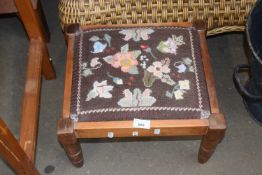 Footstool with needlepoint cover