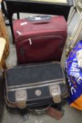 Wheeled suitcase and one other (2)