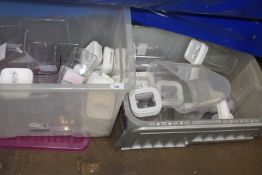 Two boxes of assorted plastic kitchen storage jars, various sizes