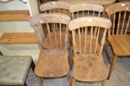 Set of four stick back kitchen chairs