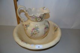 Floral decorated wash bowl and jug