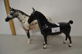 A Beswick Appaloosa horse and one other (2)