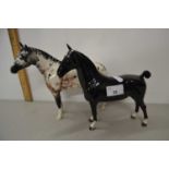 A Beswick Appaloosa horse and one other (2)
