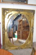 Large reproduction gilt effect framed wall mirror, 123 x 157 cm