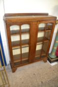 Early 20th Century glazed oak bookcase cabinet