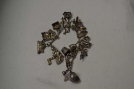 Vintage white metal charm bracelet