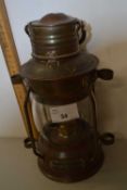 A vintage Simpson Lawrence copper mounted ships lamp