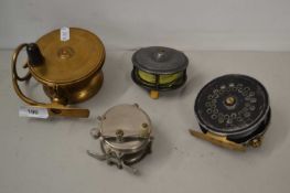 Brass centre pin fishing reel marked Mallochs Patent together with a further centre pin reel and a