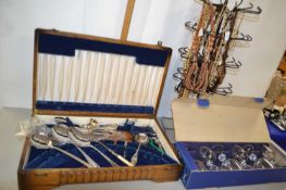 Stand of various necklaces, a cased set of Claudia glasses and a oak cutlery canteen with limited