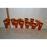 Collection of ruby and gilt wine glasses