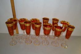 Collection of ruby and gilt wine glasses