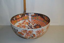 Large 20th Century Oriental circular punch bowl decorated with a central design of a vase of