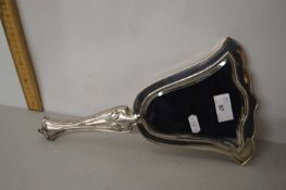 Large silver backed dressing table hand mirror