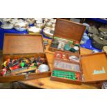 Three vintage wooden cases containing an assortment of various fishing tackle to include a range