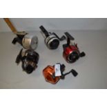 Group of five closed face centre pin fishing reels to include Daiwa and others